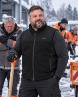 Podgrzewana kamizelka unisex z regulacją obwodu PyreFit Tarnor zimą: podczas pracy na zewnątrz